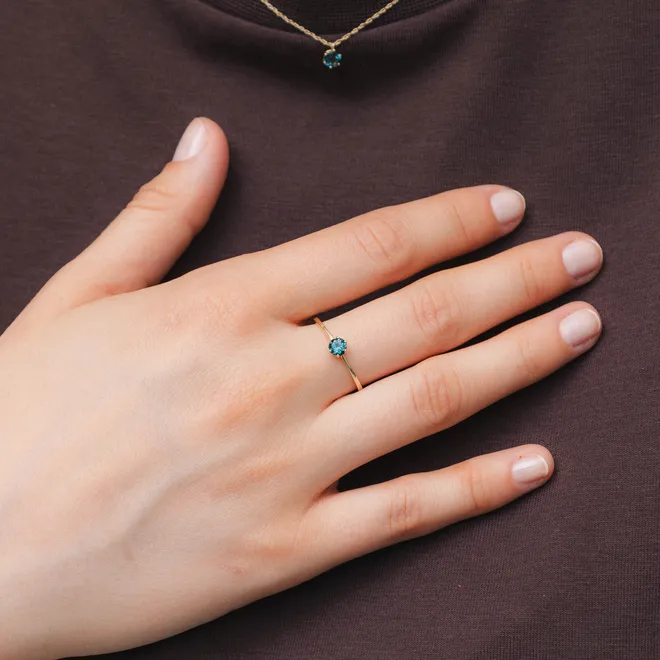 Pierścionek z topazem London Blue 3,9 mm; złoty